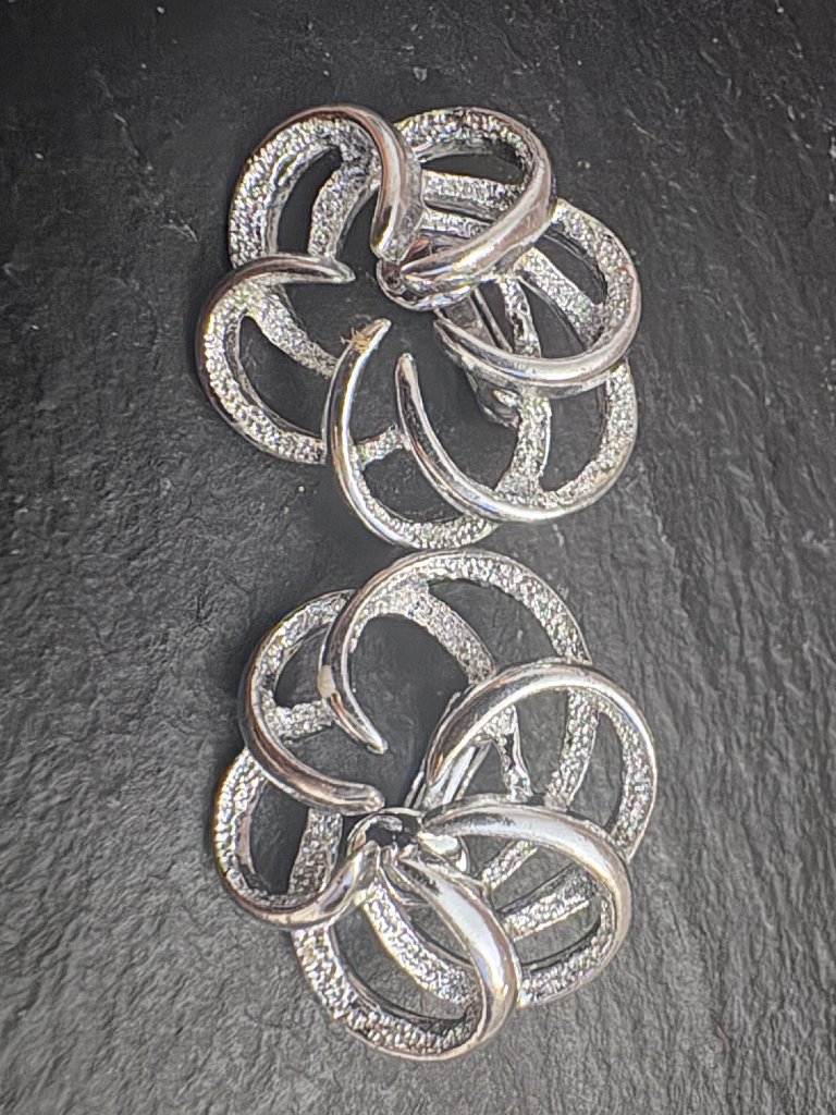 Vintage 1967 Sarah Coventry Tailored Swirl Silver Tone Clip On Earrings